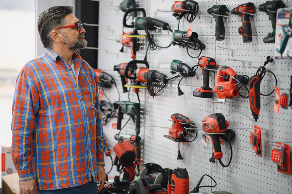 A customer needing to rent power tools in Chattanooga browsing the inventory at Action Rentals